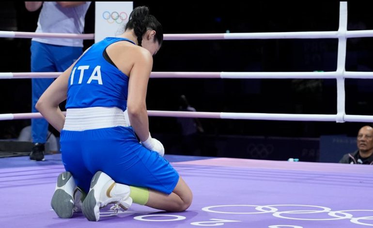 Why did an Olympic boxer resign less than a minute into the match